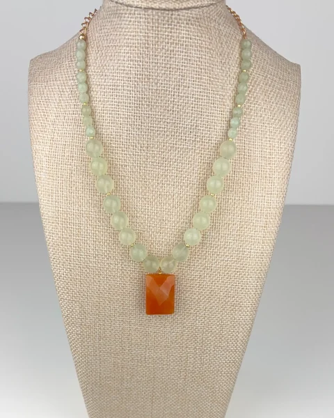 Pale Green Chalcedony and Orange Agate Necklace on a linen display bust