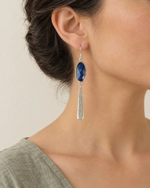 The Lapis Lazuli Etched Bar Dangle Earrings, worn